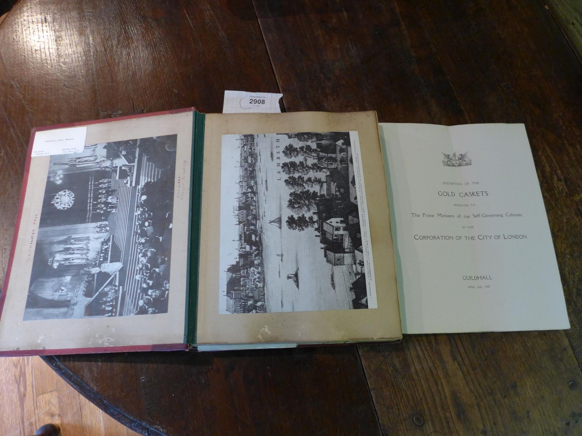 AN OLD PHOTO ALBUM WITH PHOTOS OF CATHEDRALS, HOUSES AND CASTLES ETC