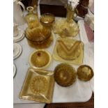 A LARGE AMOUNT OF AMBER COLOURED GLASS TO INCLUDE JUGS, PLATES, BOWLS, ETC