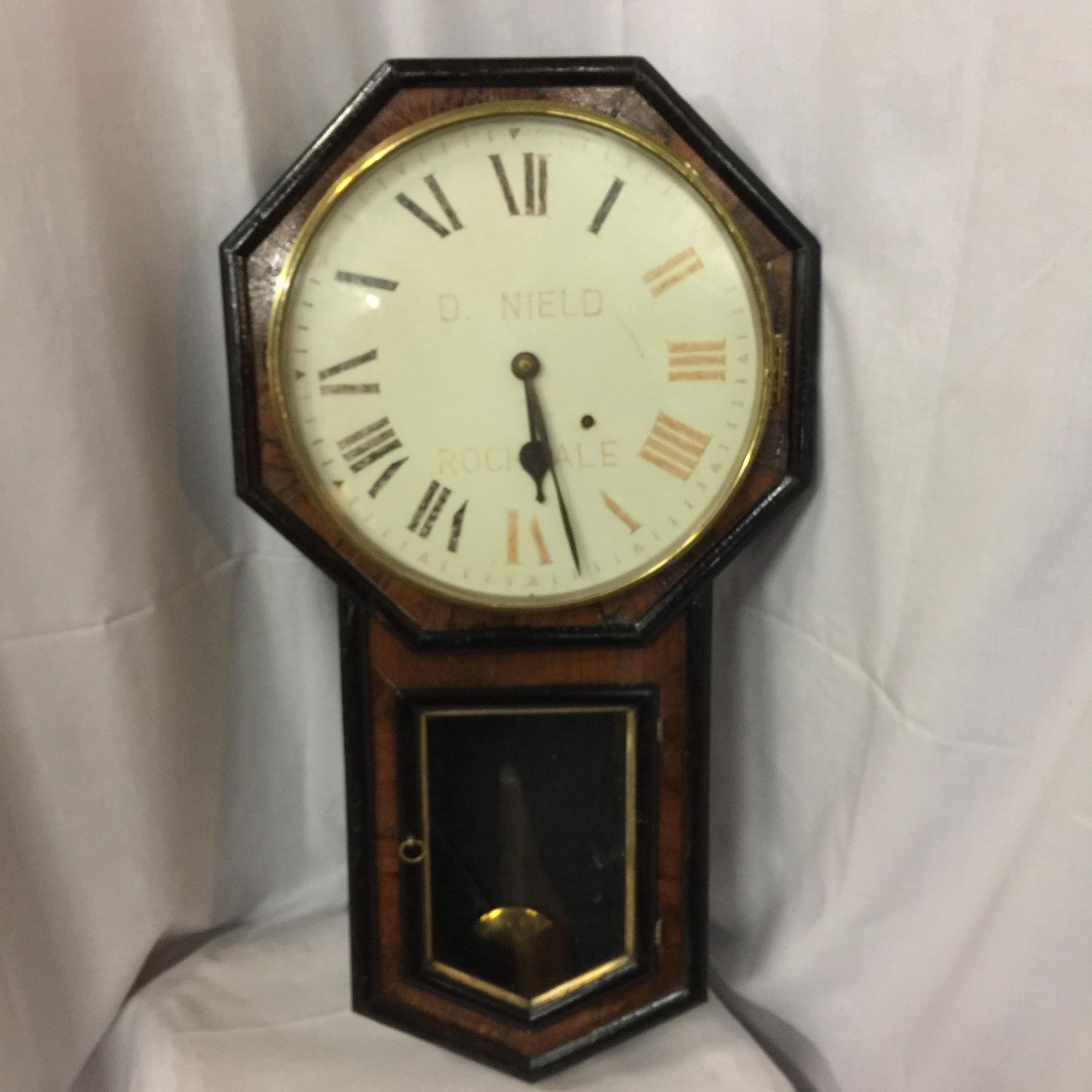 A VINTAGE WALL CLOCK D. NEILD ROCHDALE