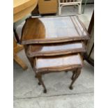 A NEST OF THREE MAHOGANY TABLES