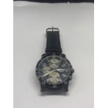 A CHRONOGRAPH WRIST WATCH WITH A BLACK LEATHER STRAP SEEN WORKING BUT NO WARRANTY