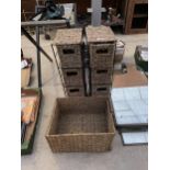 A WHICKER BASKET AND TWO FOUR DRAWER WICKER STORAGE UNITS