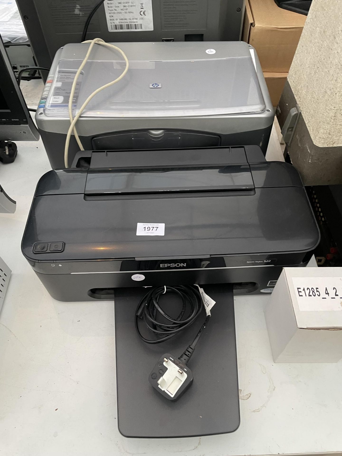 AN EPSON PRINTER AND A HP PRINTER