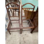 A PAIR OF EDWARDIAN MAHOGANY AND INLAID BEDROOM CHAIRS