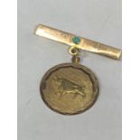 A 14 CARAT GOLD BROOCH DEPICTING TAURUS THE BULL TESTED TO AND MARKED K14 GROSS WEIGHT 3.6 GRAMS