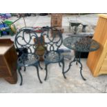 A CAST ALLOY PATIO TABLE AND TWO CHAIRS, 24" DIAMETER