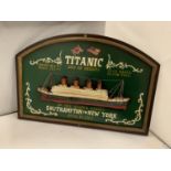 A WOODEN PAINTED 3D TITANIC SIGN