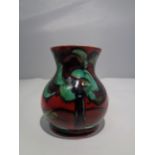 AN ANITA HARRIS HANDPAINTED AND SIGNED DECO TREE VASE