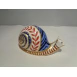 A CROWN DERBY SNAIL WITH A SILVER STOPPER