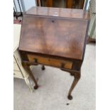 A MID 20TH CENTURY SMALL WALNUT BUREAU, 21" WIDE, ON CABRIOLE LEGS