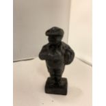 AN EARLY VICTORIAN CAST IRON PAPERWEIGHT 'THE PARSON'