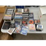 AN ASSORTMENT OF GAMES, AND DVDS
