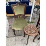 A VICTORIAN DINING CHAIR AND HEAVILY CARVED OAK TABLE