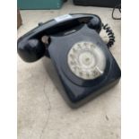 A RETRO BLACK DIAL TELEPHONE