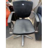 A MODERN SWIVEL OFFICE CHAIR ON POLISHED ALLOY BASE