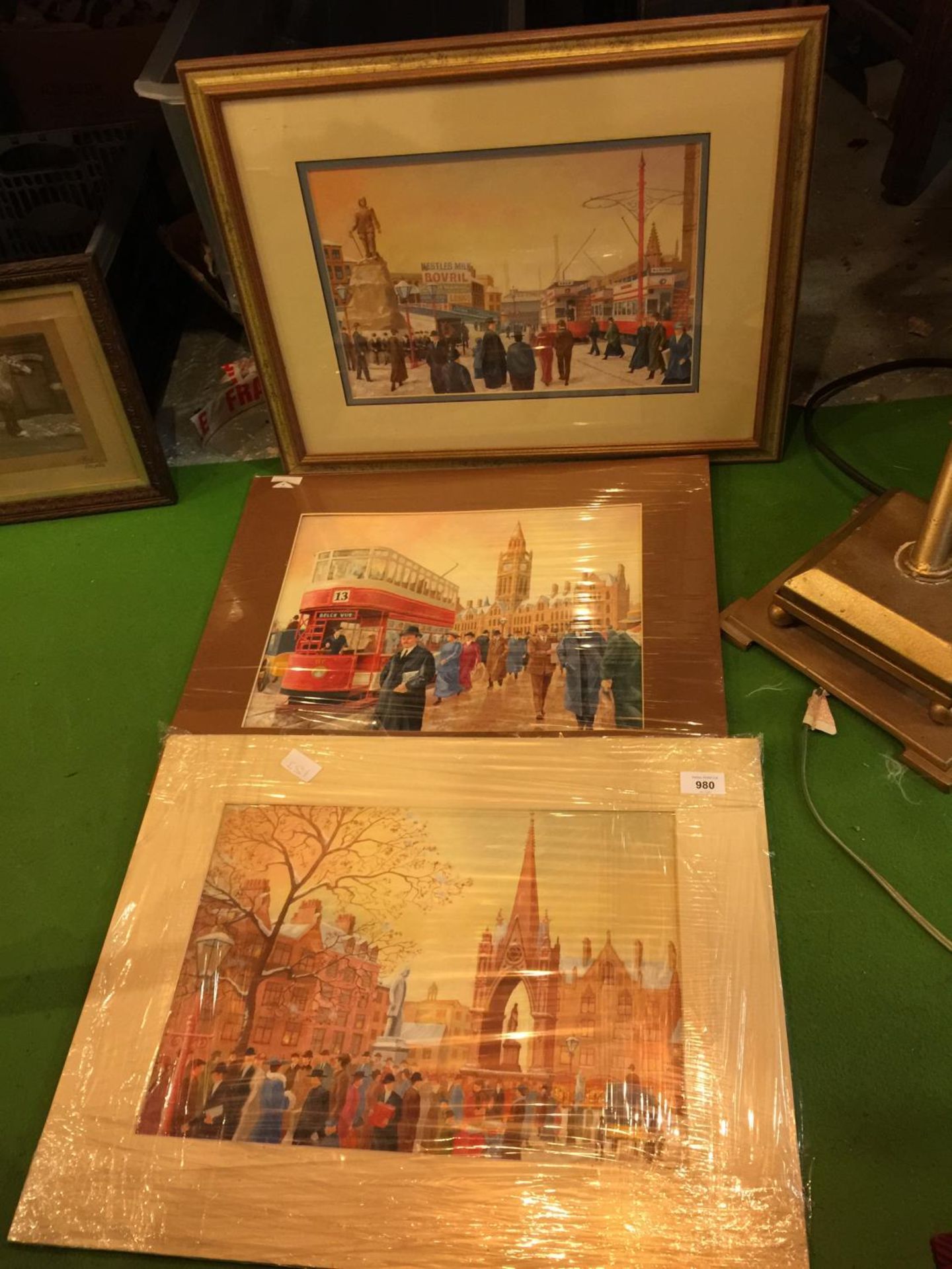 THREE MOUNTED PRINTS 'STATUE OF ST. ANNES', MANCHESTER SCENE 'BELLE VUE TRAM' AND ONE FURTHER FRAMED
