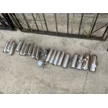 AN ASSORTMENT OF STAINLESS STEEL AND GLASS MILKING CLUSTER SPARES