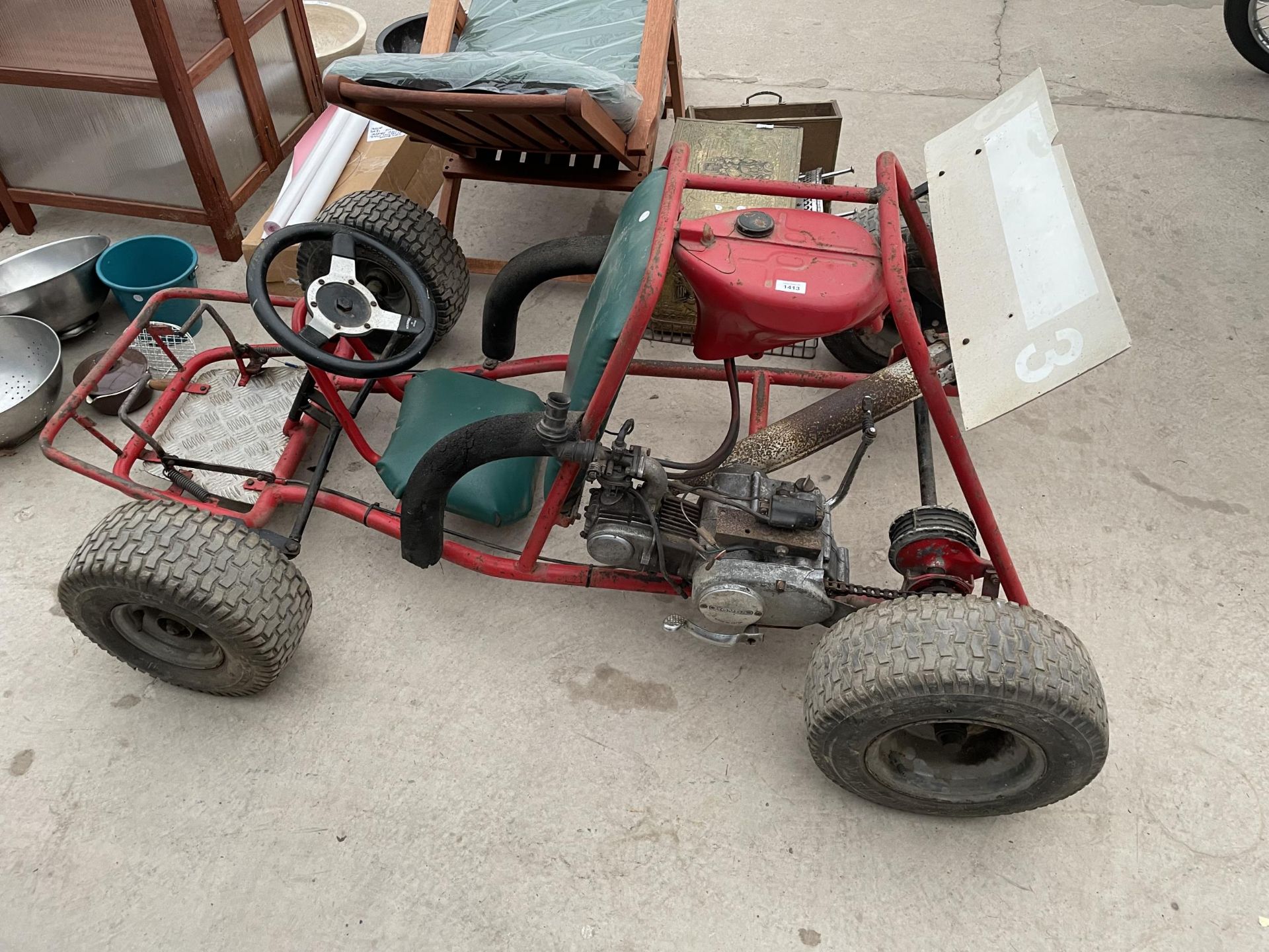 A PETROL ENIGINE METAL FRAMED GO-KART/BUGGY