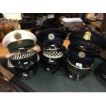 NINE ASSORTED POLICE HATS, TO INCLUDE QUEENSLAND, GERMAN U.S. ETC