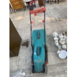 A BOSCH ROTAK 32R ELECTRIC LAWN MOWER WITH GRASS BOX IN WORKING ORDER BUT NO WARRANTY