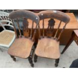 A PAIR OF ELM AND BEECH KITCHEN CHAIRS