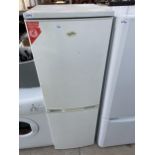 A WHITE STATESMAN UPRIGHT FRIDGE FREEZER