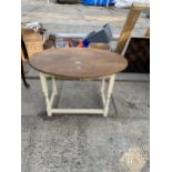 AN OVAL OAK OCCASIONAL TABLE ON PAINTED BASE