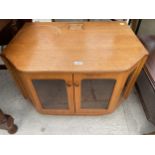 A RETRO TEAK G-PLAN TV CABINET WITH GLASS DOORS