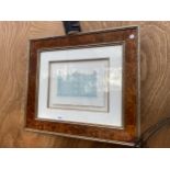 A DECORATIVE FRAMED PRINT