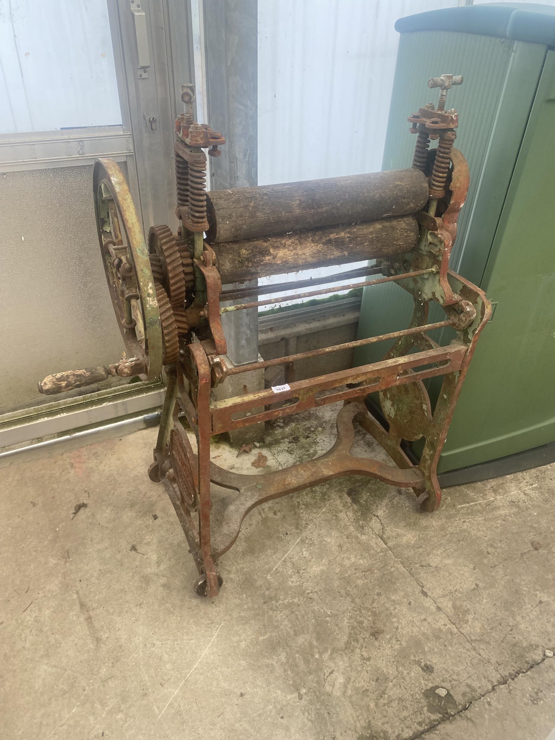 AN ANTIQUE LEWIS'S STANDEX CAST IRON MANGLE ON WHEELS (A/F) SEIZED COMPONENTS, WIDTH 82CM, HEIGHT