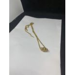 A TESTED TO 9 CARAT GOLD NECKLACE WITH A BARREL PENDANT GROSS WEIGHT 14.4 GRAMS
