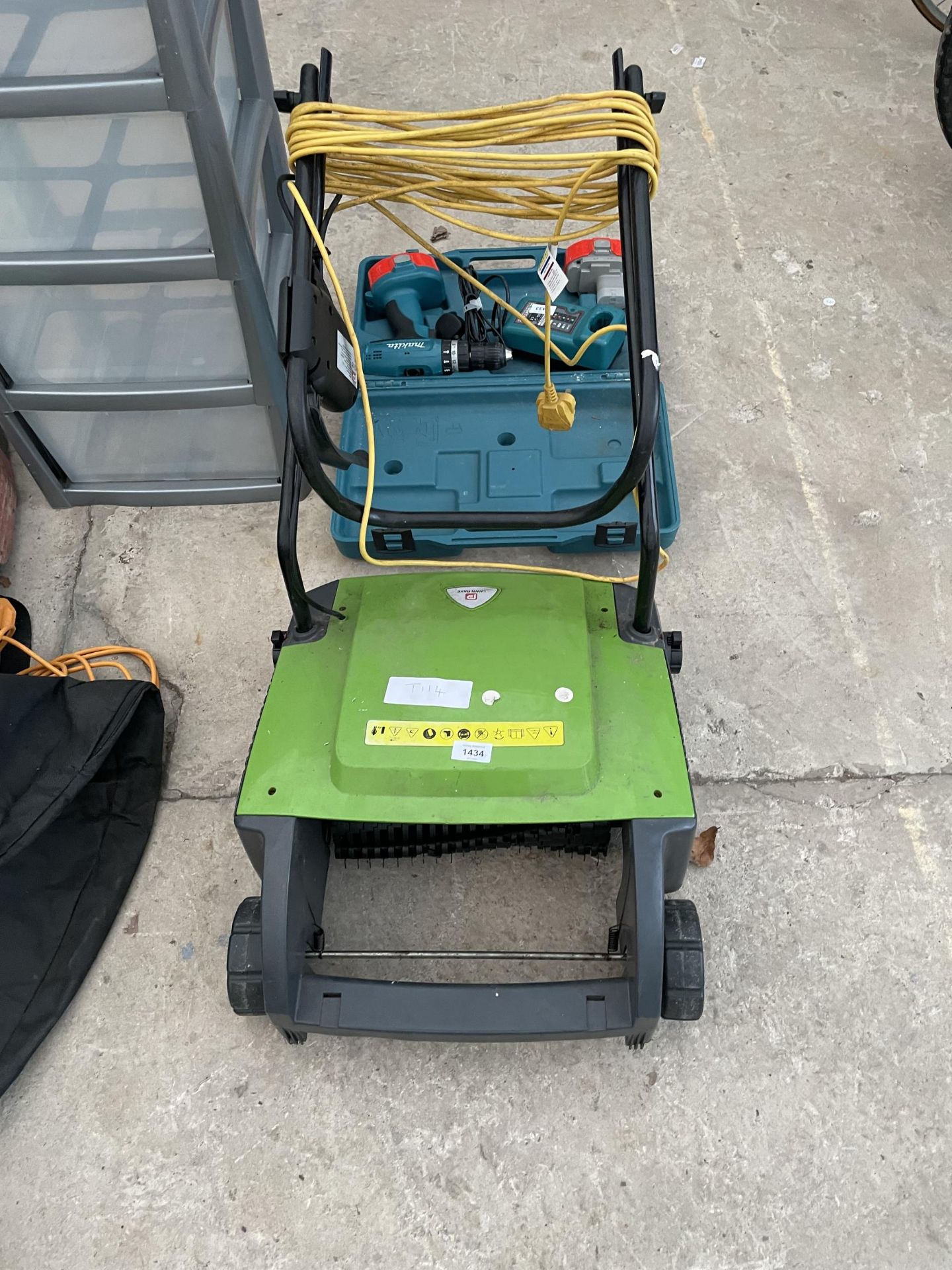 AN ELECTRIC LAWN RAKE