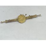 A 14 CARAT GOLD BROOCH WITH ISLAMIC INSCRIPTION GROSS WEIGHT 10.2 GRAMS
