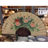 A VERY LARGE DECORATIVE FAN SIZE 92CM LONG