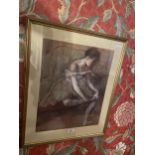 A FRAMED DEGAS PRINT OF A SEATED BALLET DANCER