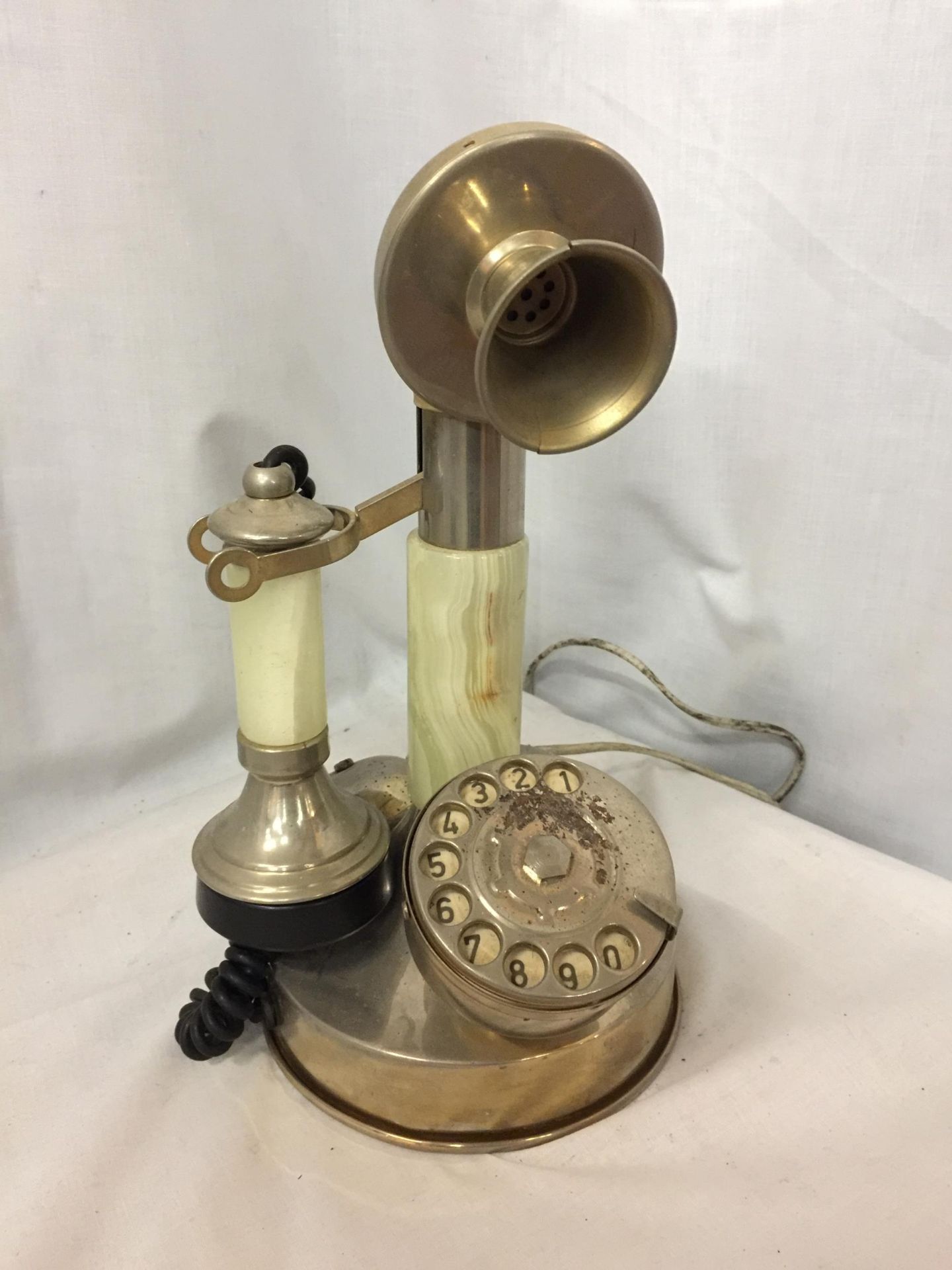 A VINTAGE STYLE WHITE METAL AND ONYX CANDLESTICK TELEPHONE CONVERTED TO MODERN SOCKET