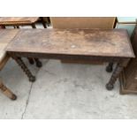 A VICTORIAN OAK CARVED SIDE TABLE ON BARLEYTWIST LEGS, 54" WIDE