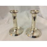 TWO HALLMARKED BIRMINGHAM SILVER CANDLE STICKS