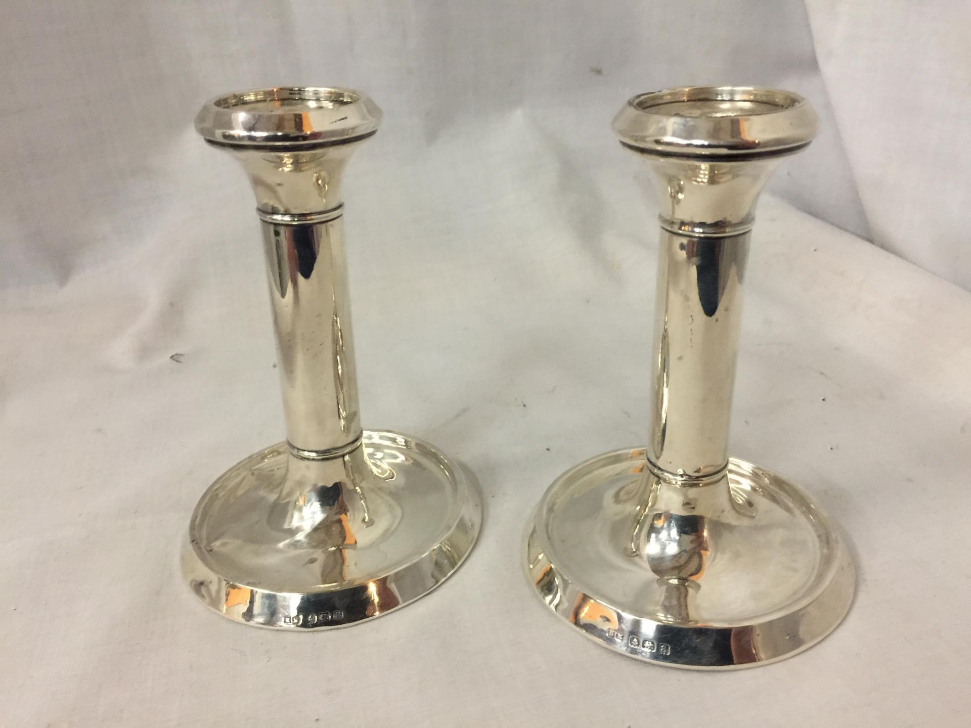 TWO HALLMARKED BIRMINGHAM SILVER CANDLE STICKS