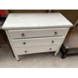 A MID 20TH CENTURY WHITE PAINTED CHEST OF THREE DRAWERS, 34.5" WIDE
