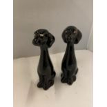 A PAIR OF KITSCH BLACK DOGS