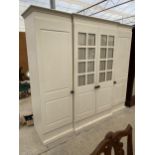 A MODERN PINE BREAKFRONT FOUR DOOR WARDROBE WITH GLAZED AND CURTAINED CENTRAL DOORS, 93" WIDE