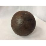 A LARGE CANNON BALL FROM H.M.S. ASSOCIATION WHICH SANK IN 1707