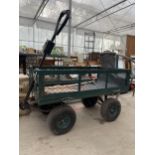 A FOUR WHEELED METAL FRAMED MARKET GARDENERS TROLLEY