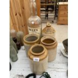 THREE VINTAGE STONEWARE VESSELS, A STONEWARE FLAGGON AND A LARGE BELLS WHISKEY BOTTLE