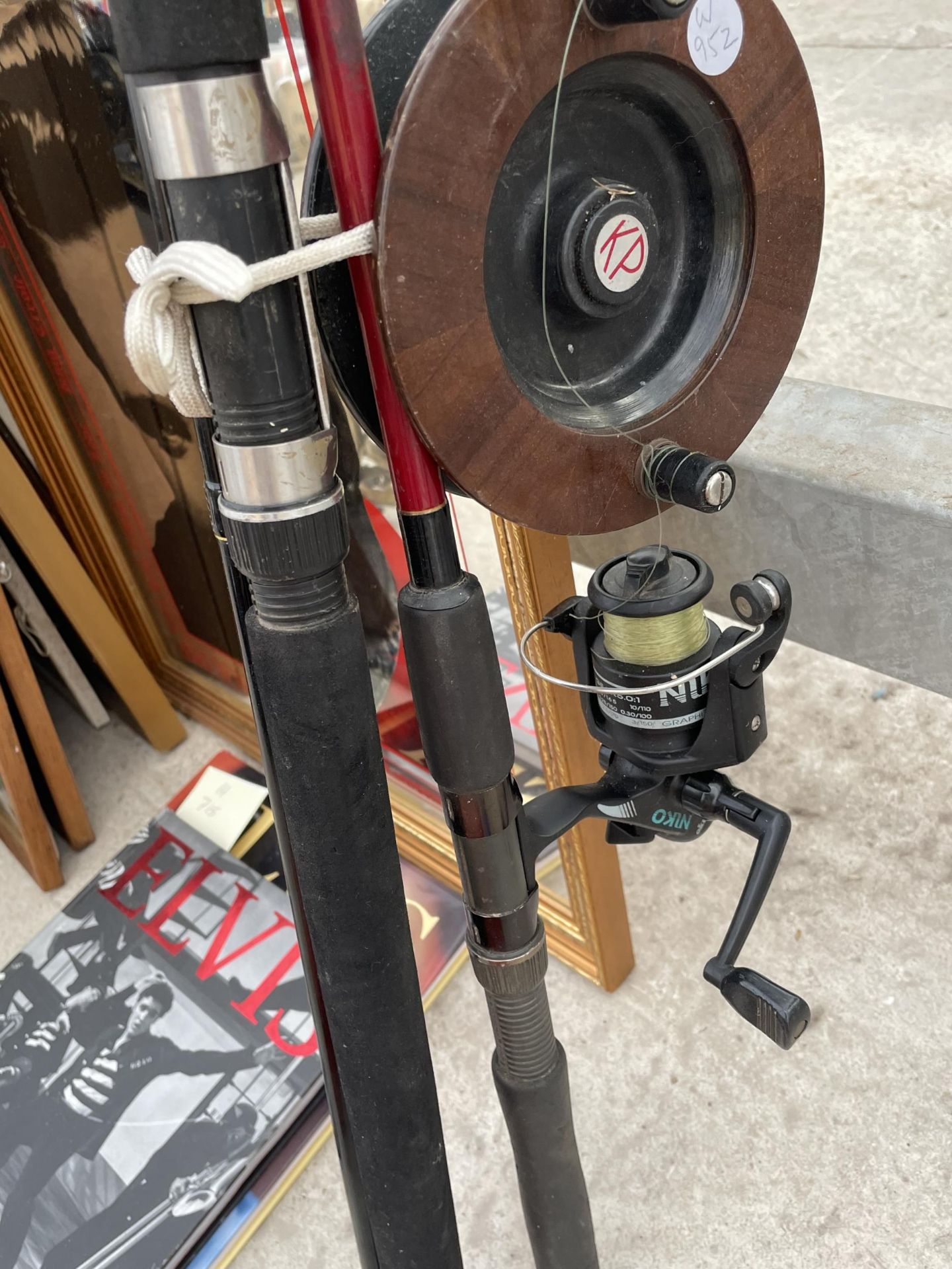 A THREE SECTION FISHING ROD WITH TWO REELS - Image 2 of 2
