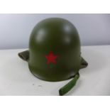 A RUSSIAN HELMET COMPLETE WITH LINING