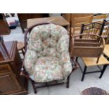 A BAMBOO AND WICKER CONSERVATORY CHAIR AND A SIMILAR MAGAZINE RACK