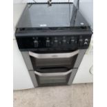 A BLACK BELLING FREESTANDING GAS COOKER AND HOB