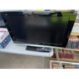 A PANASONIC 32" TELEVISION WITH REMOTE CONTROL